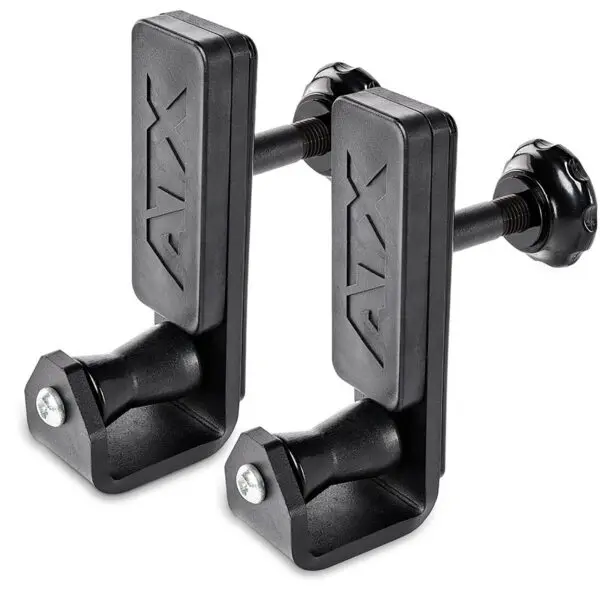 Two ATX® Roller J-Hooks Universal, black clamp-style exercise barbell holders, featuring adjustable knobs and an embossed ATX logo. They have a sturdy rectangular design with a screw for attachment.
