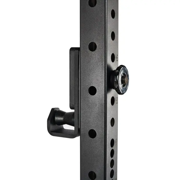 Close-up of the ATX® Roller J-Hooks Universal, featuring a black metal part with holes and a silver knob. The apparatus includes a side handle, likely part of weightlifting or adjustable rack equipment.