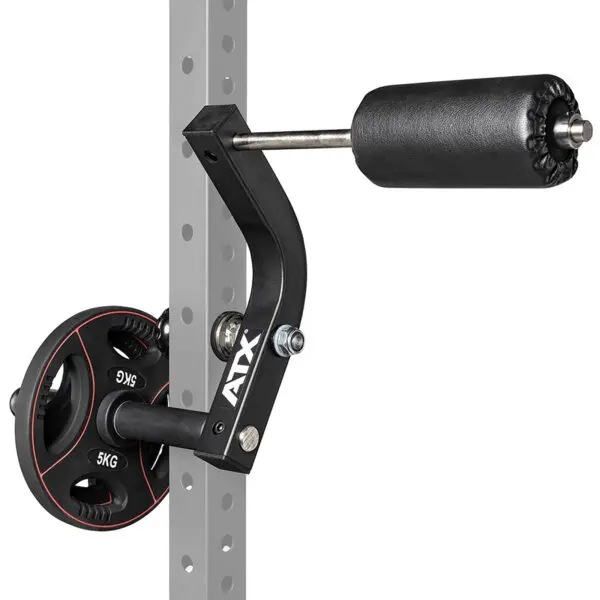 The ATX® Neck Trainer Add On, a black fitness attachment with a padded horizontal arm and 5 kg weight plate, is mounted on a gray rack for strength training exercises.