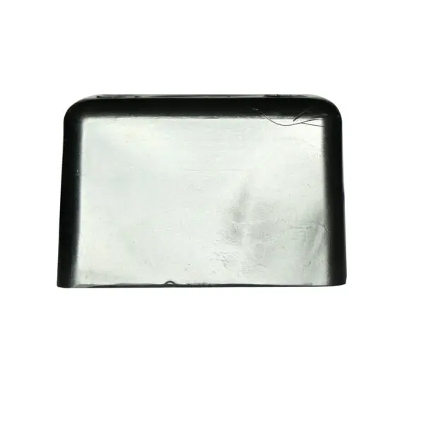 The Bump Stop 50mm x 50mm is a rectangular metal object with rounded top corners, a smooth reflective surface, and a small crack in the upper right corner on a plain white background.