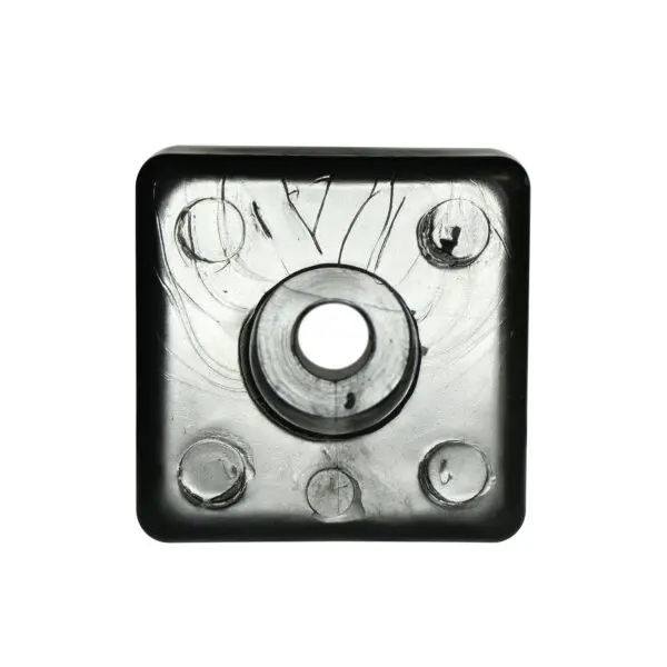 Close-up of the Bump Stop 50mm x 50mm, a black square object with a central hole and four circular indentations, featuring a glossy surface with subtle reflective patterns.