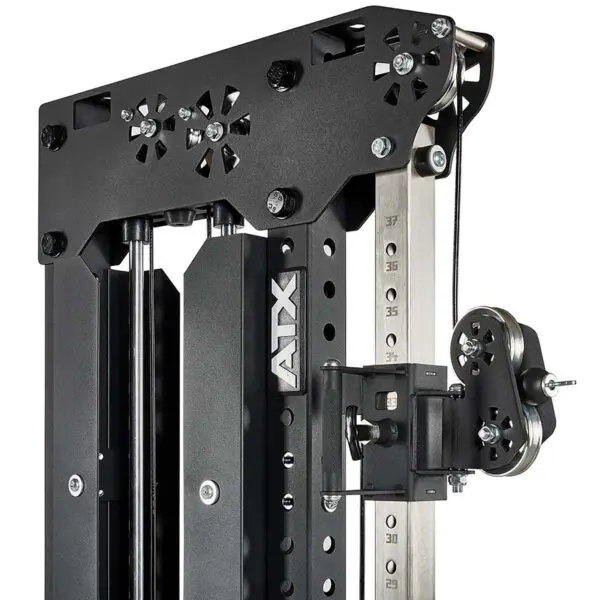 Close-up of a black cable weight machine featuring an adjustable ATX cable pulley system with numbered settings on the sturdy metal frame. The construction, complete with pulleys, cables, and weight stacks, makes it ideal for gym or fitness equipment.