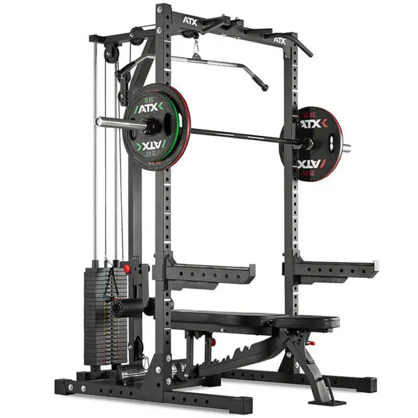 The ATX® HRX-620 Half Rack System Pin Loaded 115 kg is a multi-functional gym station featuring a squat rack with barbell and weight plates, an adjustable bench, and a pulley system for various exercises. The equipment is black with red and green accents.