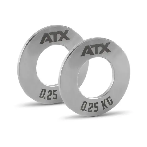 Two ATX® Olympic Fractional Plate Pairs with ATX logo and 0.25 KG engraved, each featuring a central hole for barbell mounting, set against a plain white background.