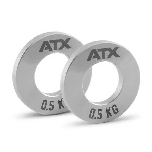 Two ATX® Olympic Fractional Plate Pairs, each weighing 0.5 kg, are positioned upright against a white background.