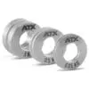 Three ATX® Olympic Fractional Plate Pairs in silver, labeled 1 kg, 0.5 kg, and 0.25 kg, are arranged in descending size with central holes for barbell placement.