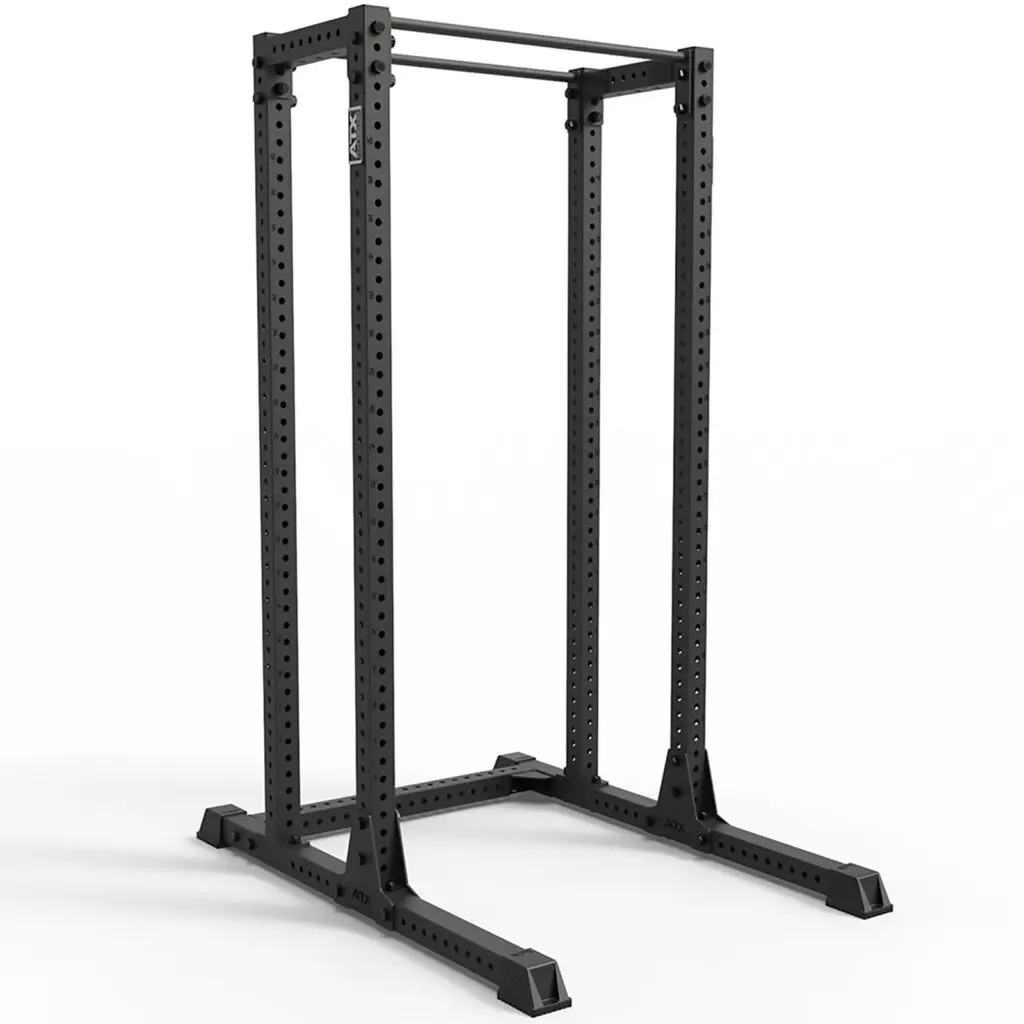 The ATX® Half Rack 810 with Extension is a black metal power rack featuring a rectangular frame, four sturdy vertical posts with adjustable attachments, and top horizontal bars for pull-ups. It is set against a white background.