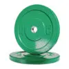 Two black 10 kg Olympic Bumper Weight Plates with central metal holes, one standing upright and the other flat on the surface.