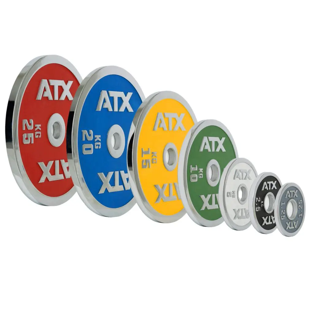 A row of ATX® Calibrated Powerlifting Plates (RL) in assorted colors and sizes from 0.5 kg to 25 kg is arranged from largest to smallest, each marked with its weight.