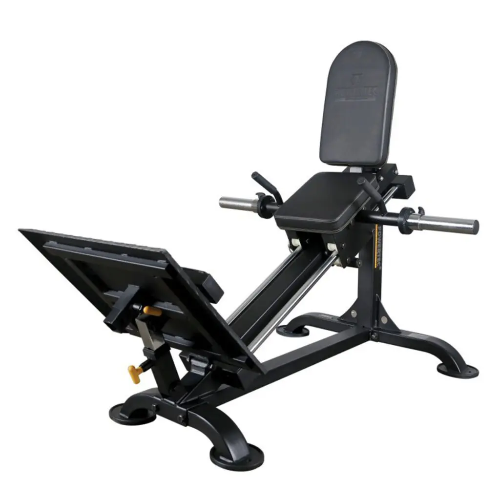 The Powertec Compact Leg Sled features a black seated calf raise machine design, complete with padded seat and backrest, an adjustable footplate, and handles on either side for support, ideal for lower leg exercises.