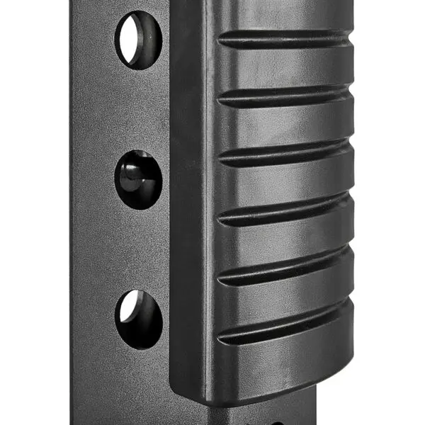 Close-up of the ATX® Trinity Tower 135 kg, a black metal structure with a glossy surface, featuring ridges on the right and circular holes on the left in an industrial design.