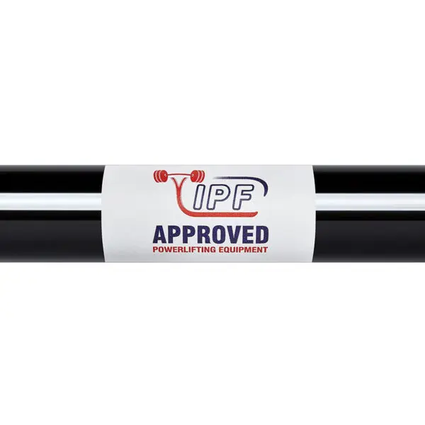 The ATX® Ram Powerlifting Bar II IPF features a black barbell with a white label displaying the IPF logo and a red weightlifting motif. Text on the label reads APPROVED POWERLIFTING EQUIPMENT in red and blue.