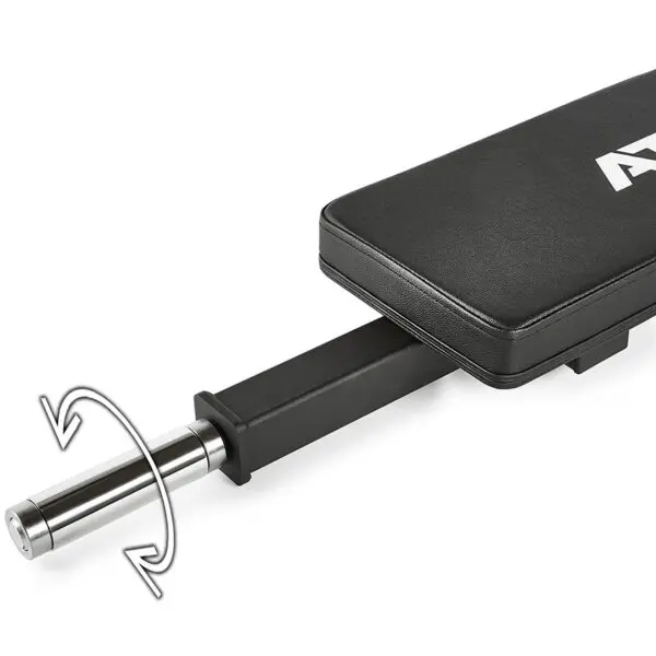Close-up of the ATX® Hip Thruster Attachment on a black adjustable workout bench, featuring a padded surface and rotation mechanism with a metal rod marked by an arrow for customizable positions.