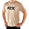 A person wearing a beige T-shirt with ATX printed in bold black letters on the front. The person has their hands on their hips and is paired with black pants. The background is plain and white.