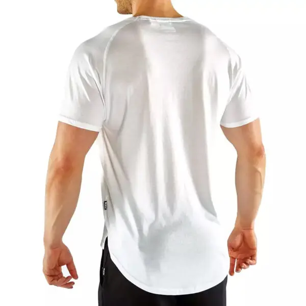 A person is shown from the back, standing against a white background, wearing an ATX® - T-Shirt White with a plain design, short sleeves, and rounded hem paired with black pants.