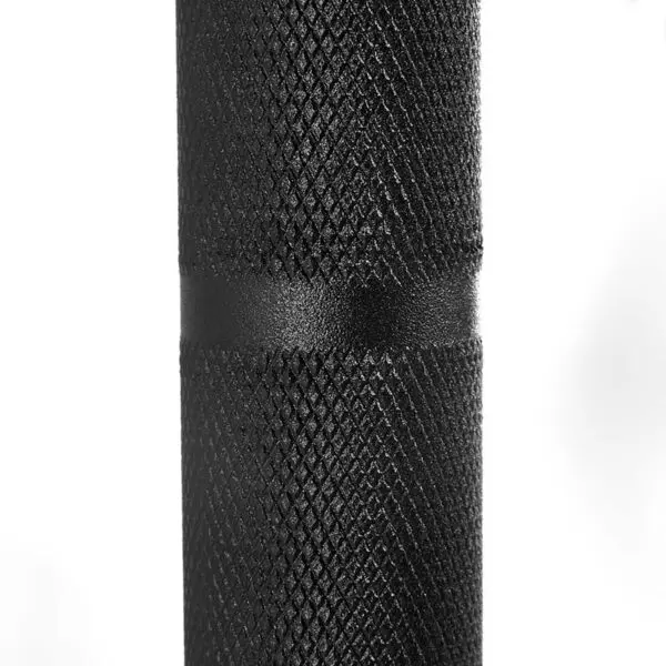 Close-up of a textured black trap bar handle with a diamond-patterned grip against a white background.
