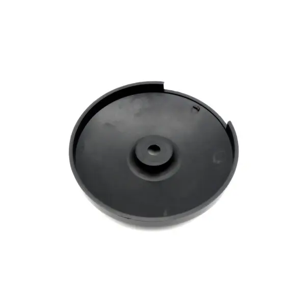 The product is the Pulley Cover 117ID, a black, round plastic item featuring a flat base, slightly raised center, and small edge notch. Its surface is smooth and plain.