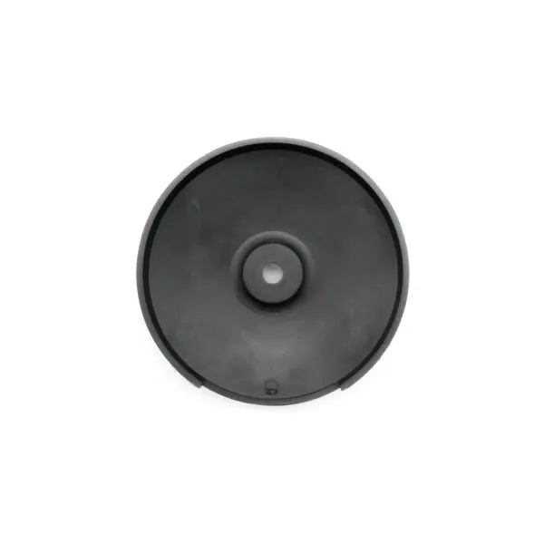 Viewed from above against a white background, the Pulley Cover 117ID is a black, circular disc with a small central hole. It features a smooth, matte surface with slight indentations.