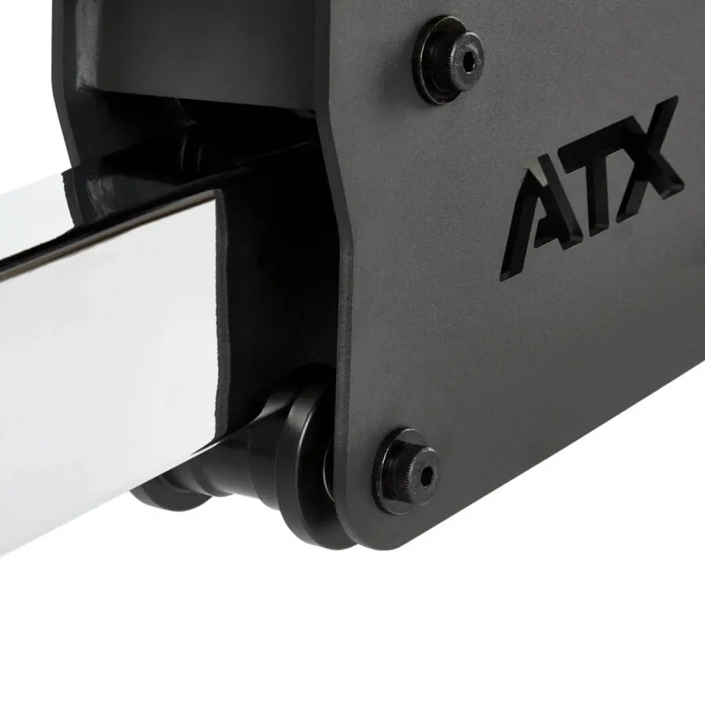 Close-up of a black ATX gym rack attachment with sturdy metal construction and visible bolts, perfectly compatible with a fid bench. The attachment features a glossy bar.