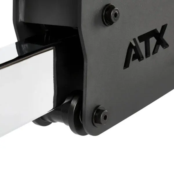 Close-up of a black ATX gym rack attachment with sturdy metal construction and visible bolts, perfectly compatible with a fid bench. The attachment features a glossy bar.
