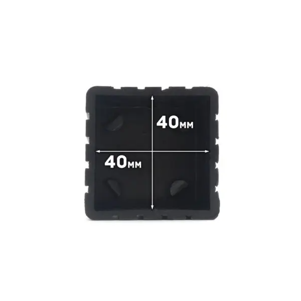 The Rubber Foot 40mmx40mm is a black, square object with dimensions of 40 mm by 40 mm. It has a grooved outer edge and a plain inner surface.