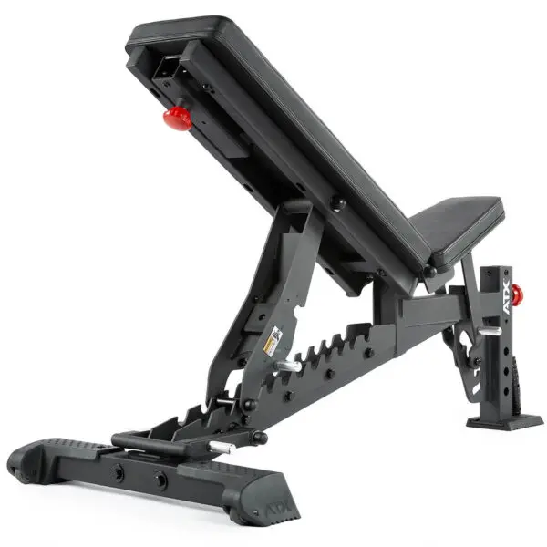The ATX® Commercial FID Bench ATX-MBX-660 is a black flat incline bench with padded seating, a sturdy metallic frame, visible adjustment notches, and a distinctive red adjustment knob for versatile workouts.