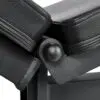 Close-up of the ATX® Commercial FID Bench ATX-MBX-660, a black adjustable flat incline bench with two padded sections connected by a hinge joint. It features a textured, leather-like surface.