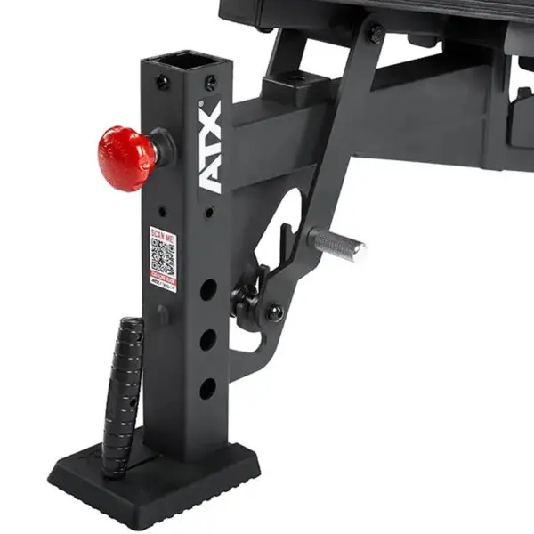 Close-up of the ATX® Commercial FID Bench ATX-MBX-660, featuring a red adjustment knob, black handle, and multiple height setting holes on an incline bench support. The ATX logo stands out on the support column.