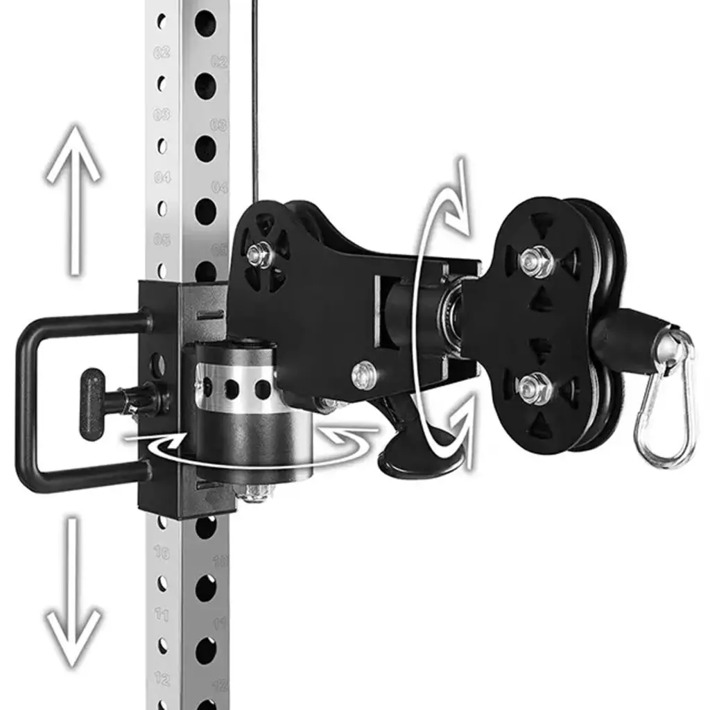 Close-up of a black pulley system attached to a metal rack with multiple adjustment holes. Arrows indicate rotational and up-down movement. A hook is visible at the end of the pulley cable.