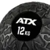 Close-up of an ATX® Slam Ball with a textured black surface and a rugged pattern. The brand ATX and weight 12 KG are displayed in white on its smooth circular patch.