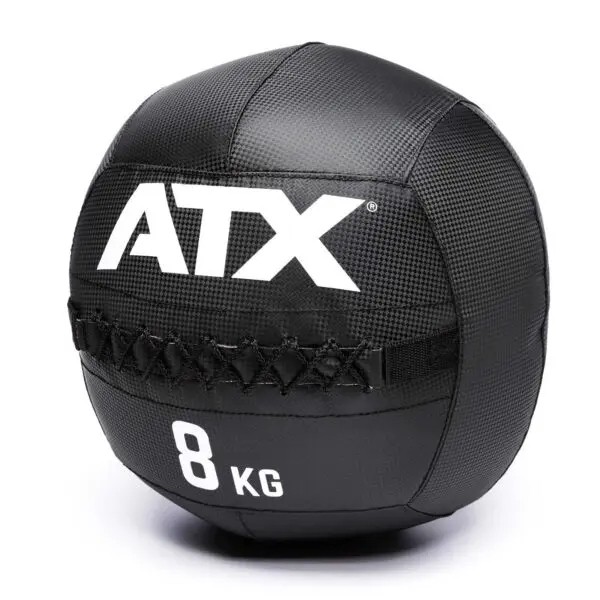 A black ATX® Wall Ball with ATX in large white letters, displaying the weight 8 KG in white. It features a textured surface and visible stitching.