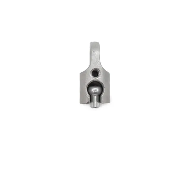 The Gym Cable 6948 Connector is a metallic component with a rounded top, a protruding cylindrical part, and features a hook-like top detail and a small hole near the center. It resembles a mechanical or industrial piece.