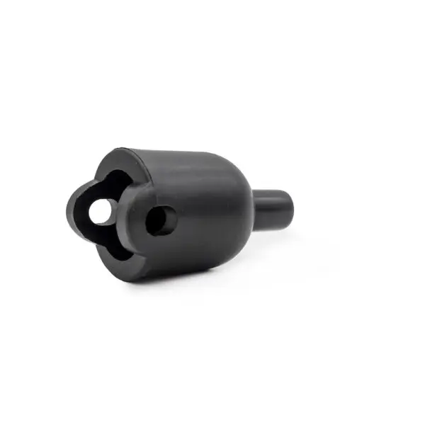 The Gym Cable 6948 Connector, a black cylindrical part with a rounded end, is shown partially on its side against a white background. Its opposite end has a circular opening and keyhole-shaped cutout.