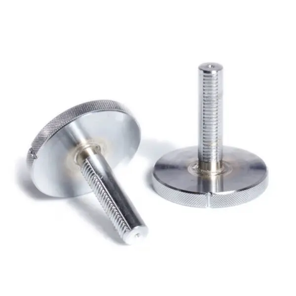 Two metal screws with knurled round heads and threaded shafts rest on a white surface, with one upright and the other lying down. The design evokes Ironmaster Quick-Lock Adjustable Dumbbells, implying easy hand adjustment for versatile use.