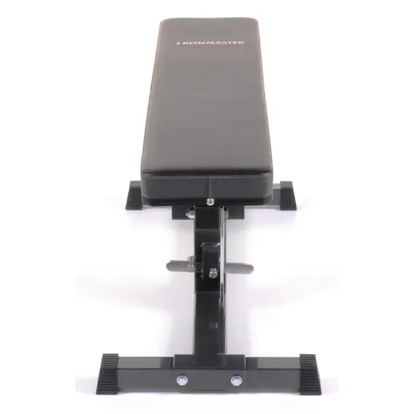 The Ironmaster Super Weights Bench is a flat, adjustable weight bench with a black padded surface and metal frame. Featuring sturdy legs with rubber feet for stability, it’s perfect for strength training exercises.