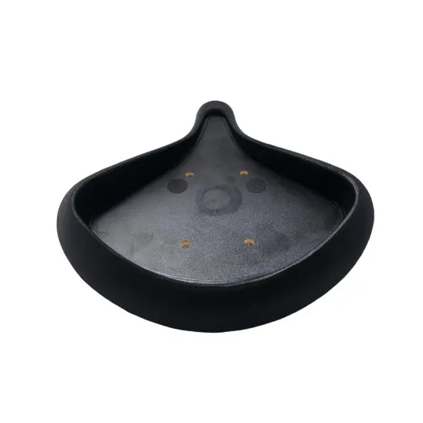 A black, teardrop-shaped object with a smooth surface and three small holes near the wide end. The object has a raised edge and a matte finish.