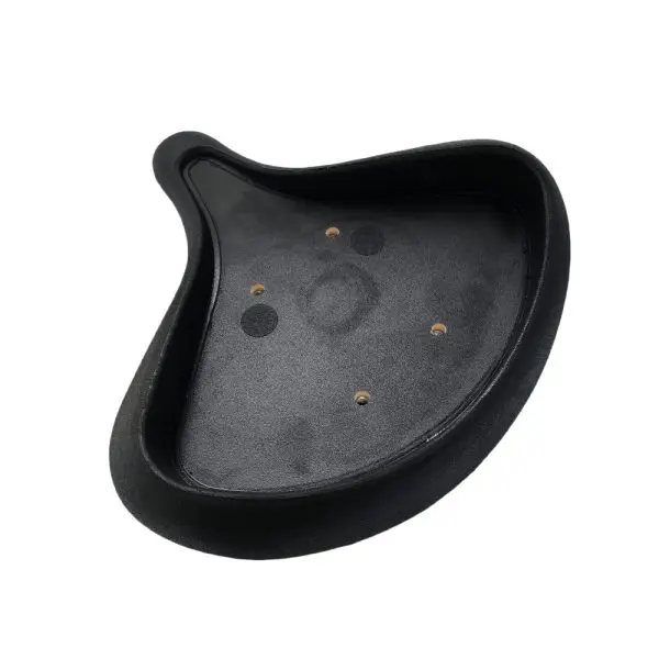 Black, teardrop-shaped object with a smooth, concave surface and several small, evenly spaced holes near the center. Likely a component or base for a larger item.