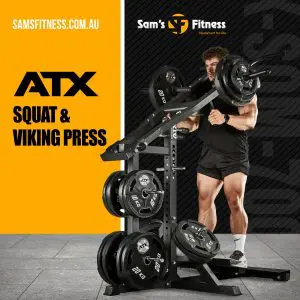 A man in athletic wear uses the ATX Squat & Viking Press machine, surrounded by weight plates, with “Sam’s Fitness” and “ATX Squat & Viking Press” text on the image. Website samsfitness.com.au appears at the top left.