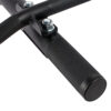Close-up of the ATX® Chin Up Bar Wall Mounted with textured black metal grips and two shiny metallic bolts, showcasing a sleek, sturdy design ideal for fitness equipment or machinery.