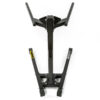 Introducing the ATX® Dip Station, a black weightlifting trap bar featuring a hexagonal frame with raised handles on each side, reminiscent of those found on a dip workout machine. Positioned upright against a white background, it highlights its design to offer an optimal grip during exercises.