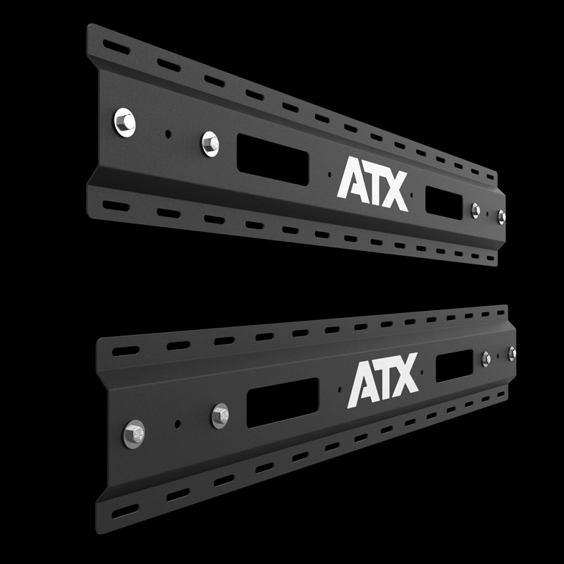 Two black metal brackets with multiple holes and the white ATX® logo are shown side by side against a black background. These brackets are components of the ATX® Fold Back Rack - Wall Mounted.