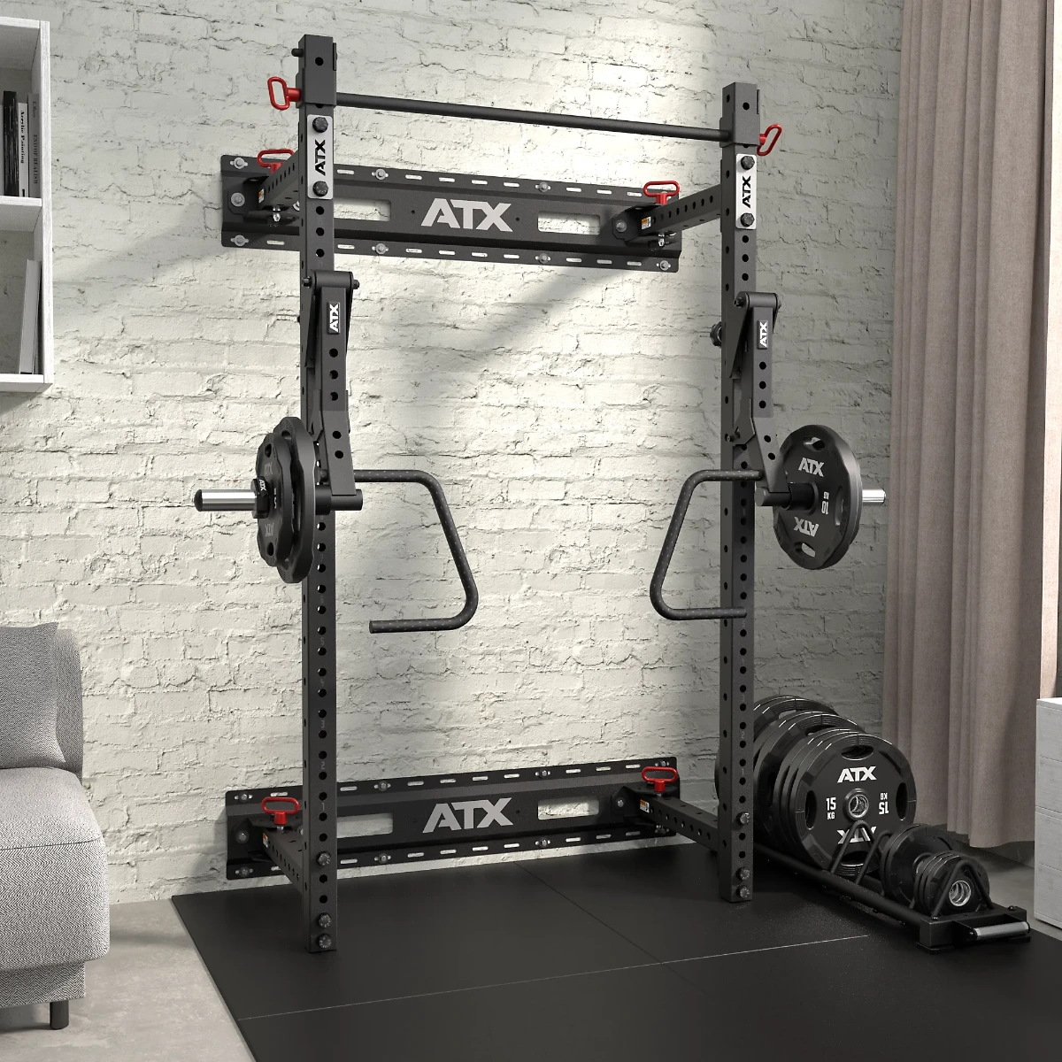An ATX® Fold Back Rack - Wall Mounted is installed in a home gym against a light brick wall, accompanied by weights and resistance bands, next to a gray sofa and beige curtains.