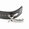 The ATX® Lever Leather Powerlifting Belt is displayed, featuring a sleek black leather design and a silver metal latch buckle. It boasts multiple adjustment holes and neatly stitched edges, with the partially open latch showcasing its modern style.