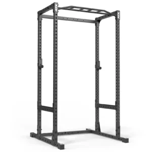 The ATX® Power Rack 520 215cm is a freestanding metal power rack with a sturdy rectangular base, adjustable barbell supports through multiple holes, and features a pull-up bar at the top for strength training exercises.