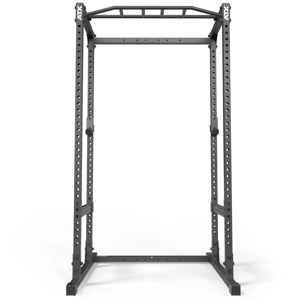 The ATX® Power Rack 520 215cm appears against a plain white background. This black rack boasts a sturdy frame with multiple adjustment holes, features a pull-up bar at the top, and is ideal for weightlifting and strength training exercises.