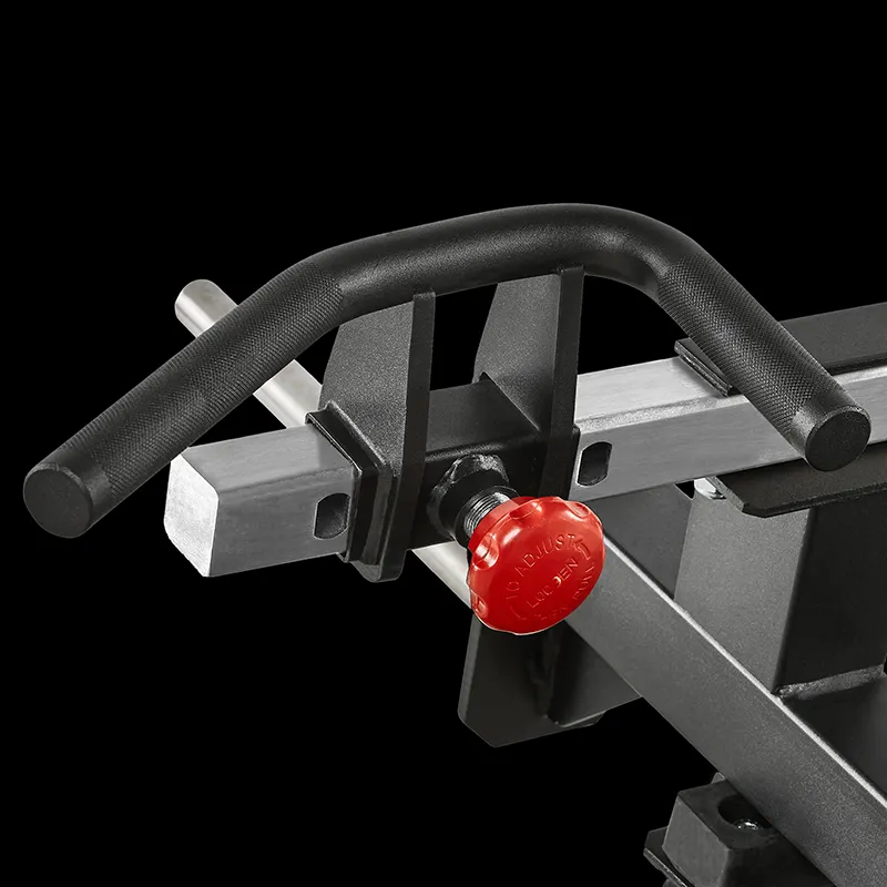 Close-up of the ATX® T-Bar Row Machine's adjustment mechanism, featuring a black handle and red knob mounted on a silver bar against a black background.