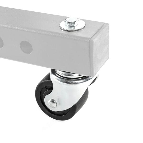 Close-up view of the ATX® Wheel Set Stand, featuring a small black caster wheel attached to a gray metallic square tube with circular side holes. The wheel is mounted on a metal bracket for smooth rotation and movement.