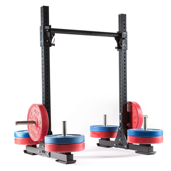 The ATX® Bulls Strongman Yoke DISCONTINUED features a heavy-duty black steel frame with multiple adjustable height holes, loaded with red and blue weight plates on each side, ideal for strength training exercises.