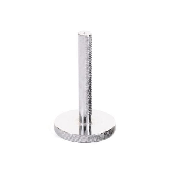 The Add On Kit Kettlebell Screw features a silver, cylindrical threaded rod and a round, flat base with a textured edge. The vertically oriented rod has grooves along its length, set against a plain white background.
