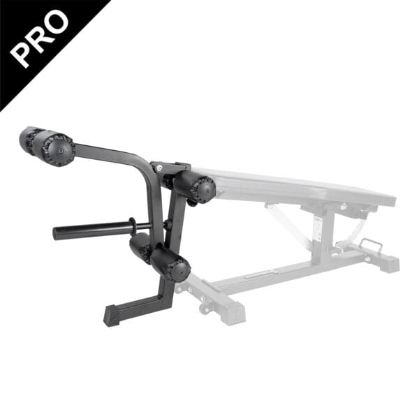 The Ironmaster Leg Lift PRO, featuring roller pads, is attached to a transparent gym bench for leg exercises and muscle training. A PRO label is visible in the top left corner.